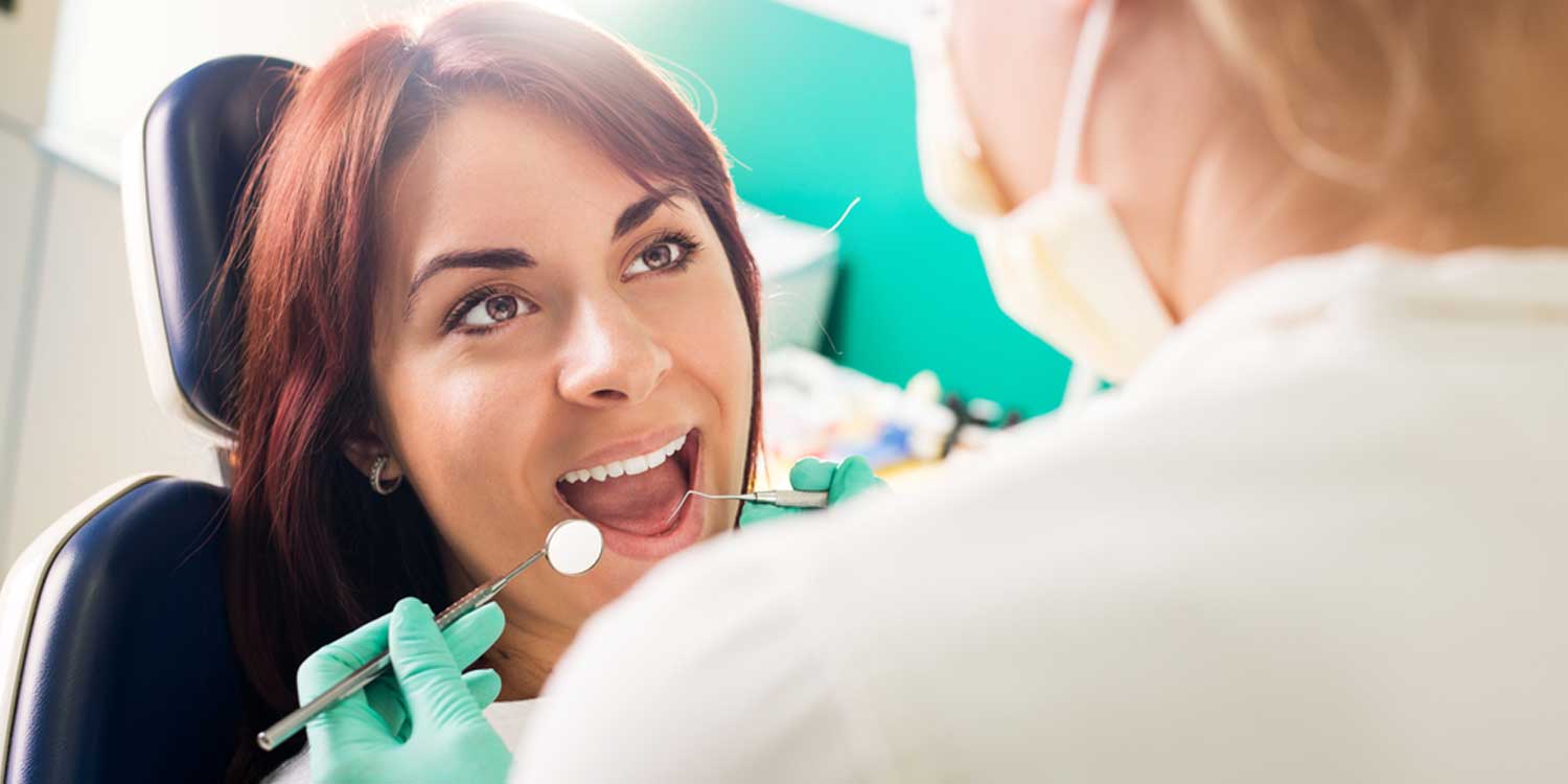 Doctor is Checking Patient's Mouth