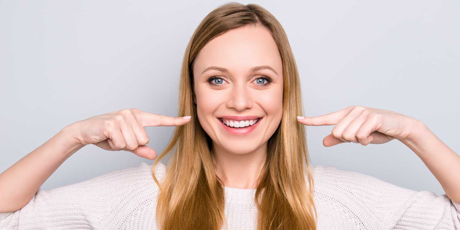 Happy Girl is Showing Her Teeth